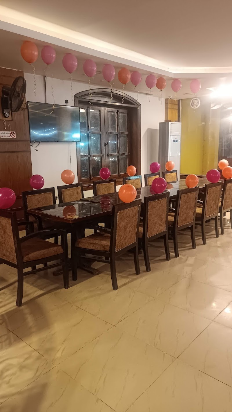 مطعم وكافية الواحة - Photo 2