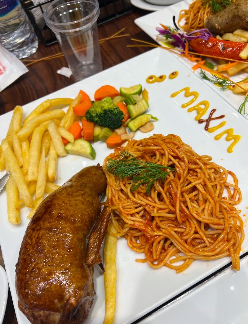 Maxim Restaurant and Cafe - Photo 2