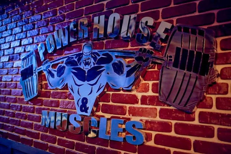 Power House & Muscles - Photo 1