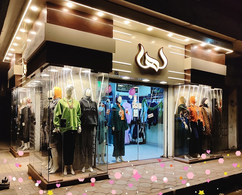 Her shop for women's clothing - Photo 2