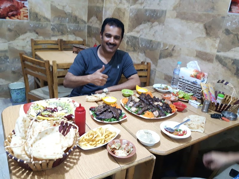 مطعم بيتزا ومشويات خالد العمدة - صورة 1